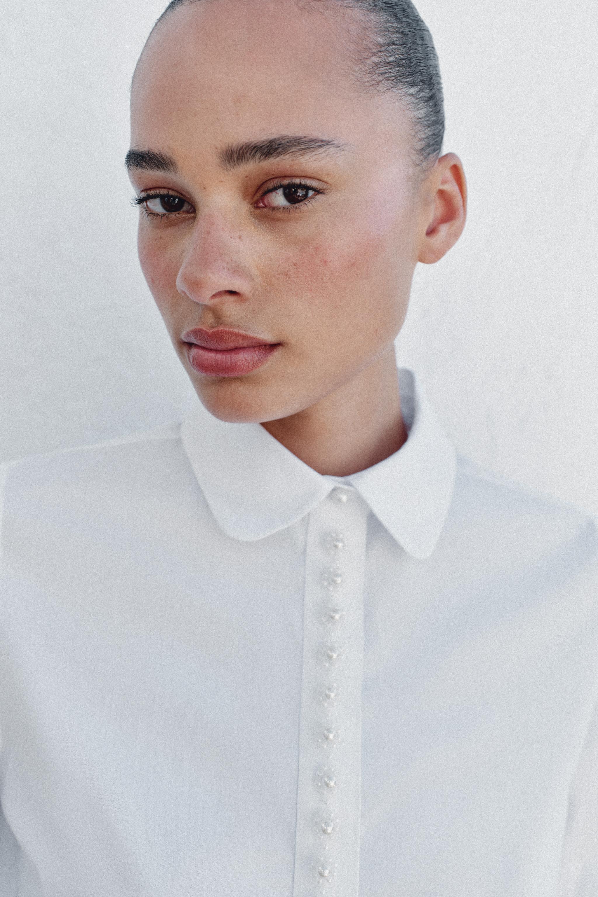 CHEMISE MANCHES COURTES À PERLES